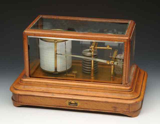 Appraisal: A VICTORIAN BAROGRAPH in light oak case with glazed panels