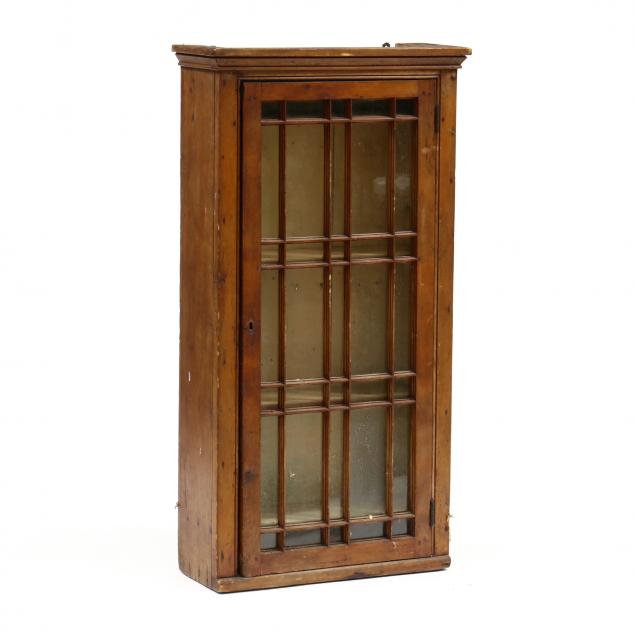 Appraisal: ANTIQUE SOUTHERN HANGING CABINET Late th century mixed woods one