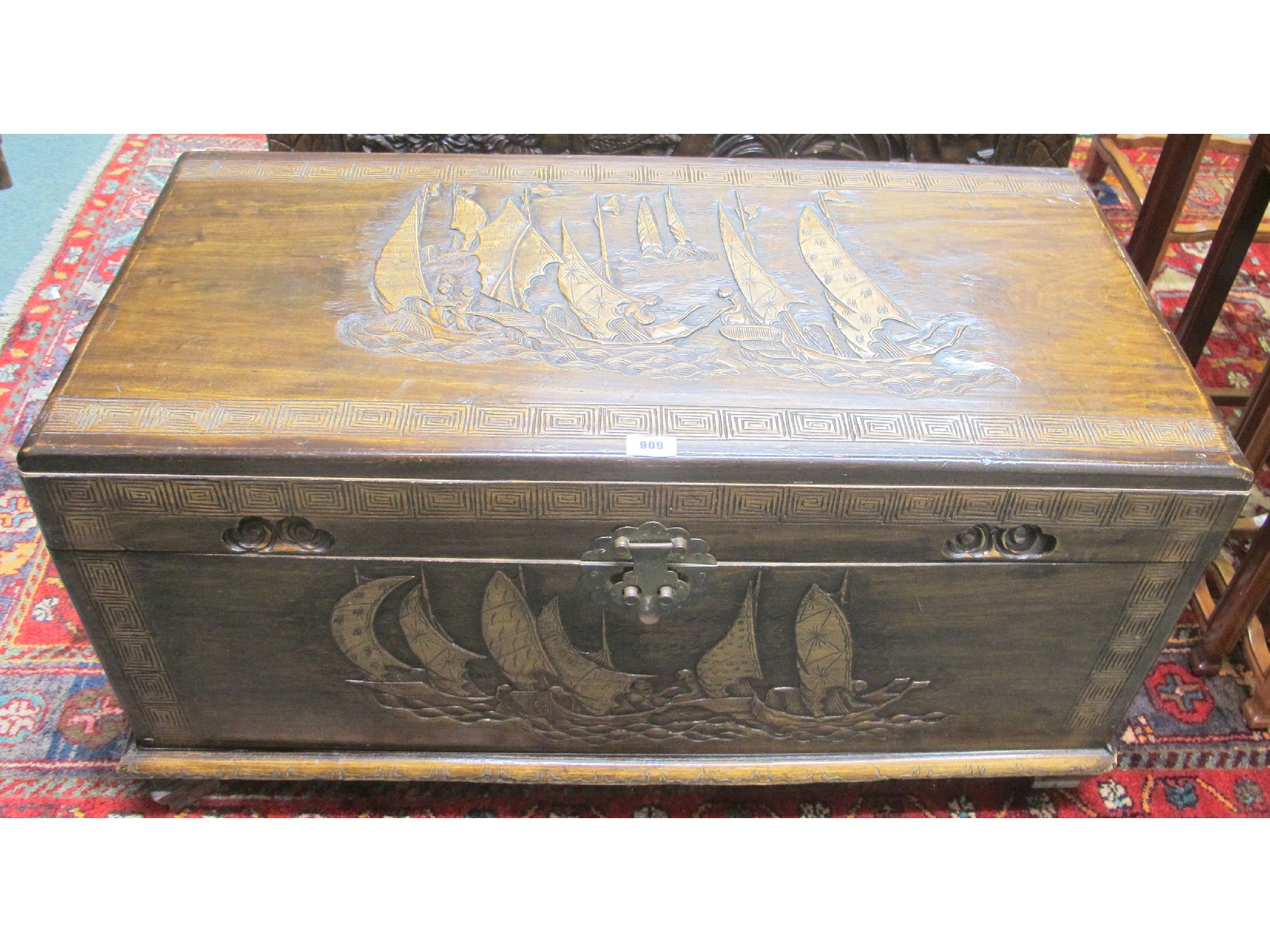 Appraisal: A Victoria Brand Chinese camphor wood carved trunk with brass