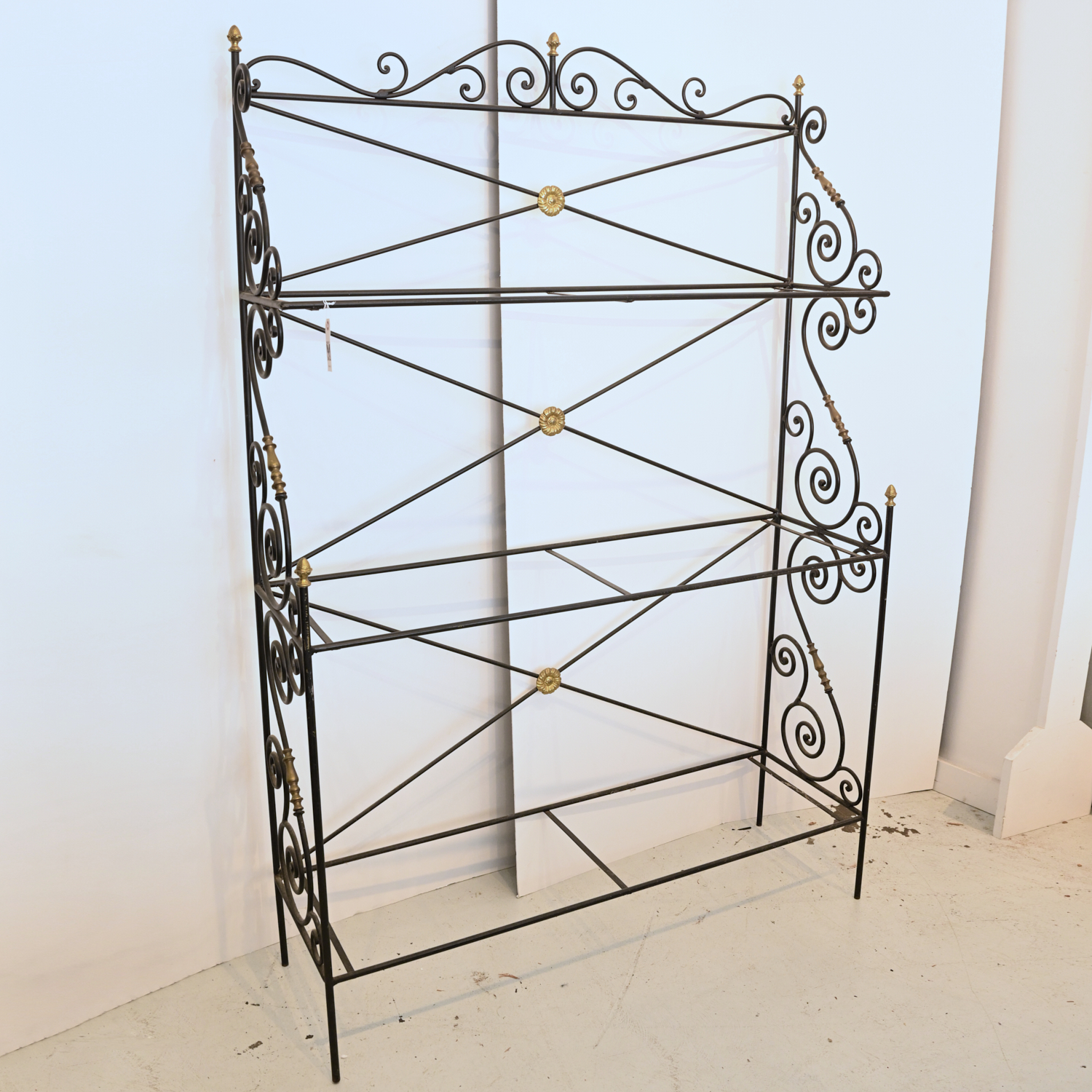 Appraisal: FRENCH STYLE WROUGHT IRON BAKER'S RACK th c scrolled black