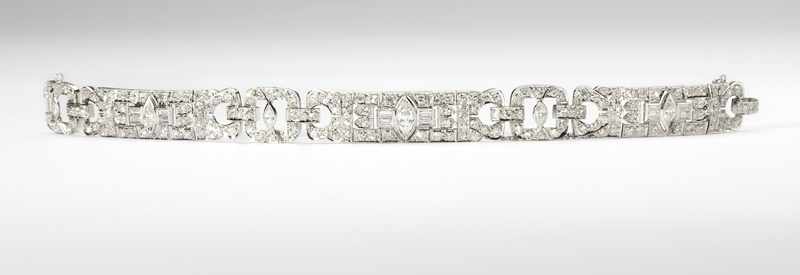 Appraisal: Platinum sectional links set with marquise shape diamonds with baguette