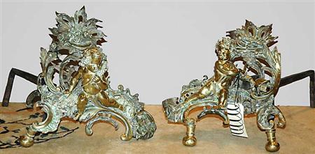 Appraisal: Pair of Rococo Style Brass Chenets Estimate -