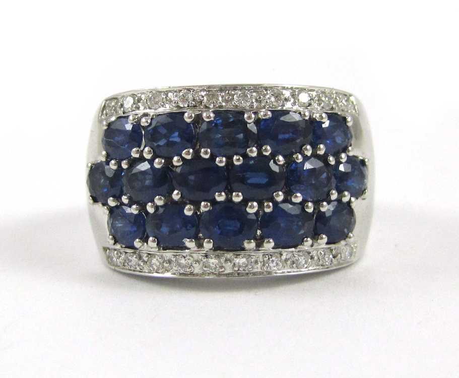 Appraisal: LAURA RAMSEY SAPPHIRE AND DIAMOND RING k white gold set