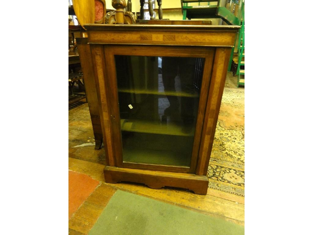 Appraisal: A Victorian walnut pier cabinet with inlaid banded detail and