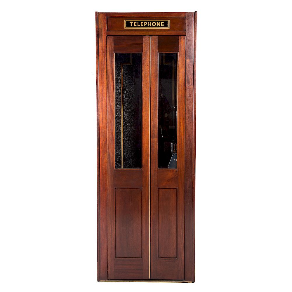 Appraisal: American Mahogany Telephone Booth circa s glass inset bifold door