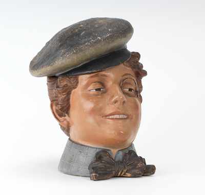 Appraisal: A Female Head Tobacco Jar of Capped Lady with Monocle