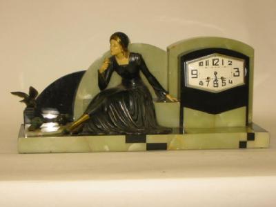 Appraisal: A FRENCH ART DECO ONYX CASED MANTEL CLOCK the twin