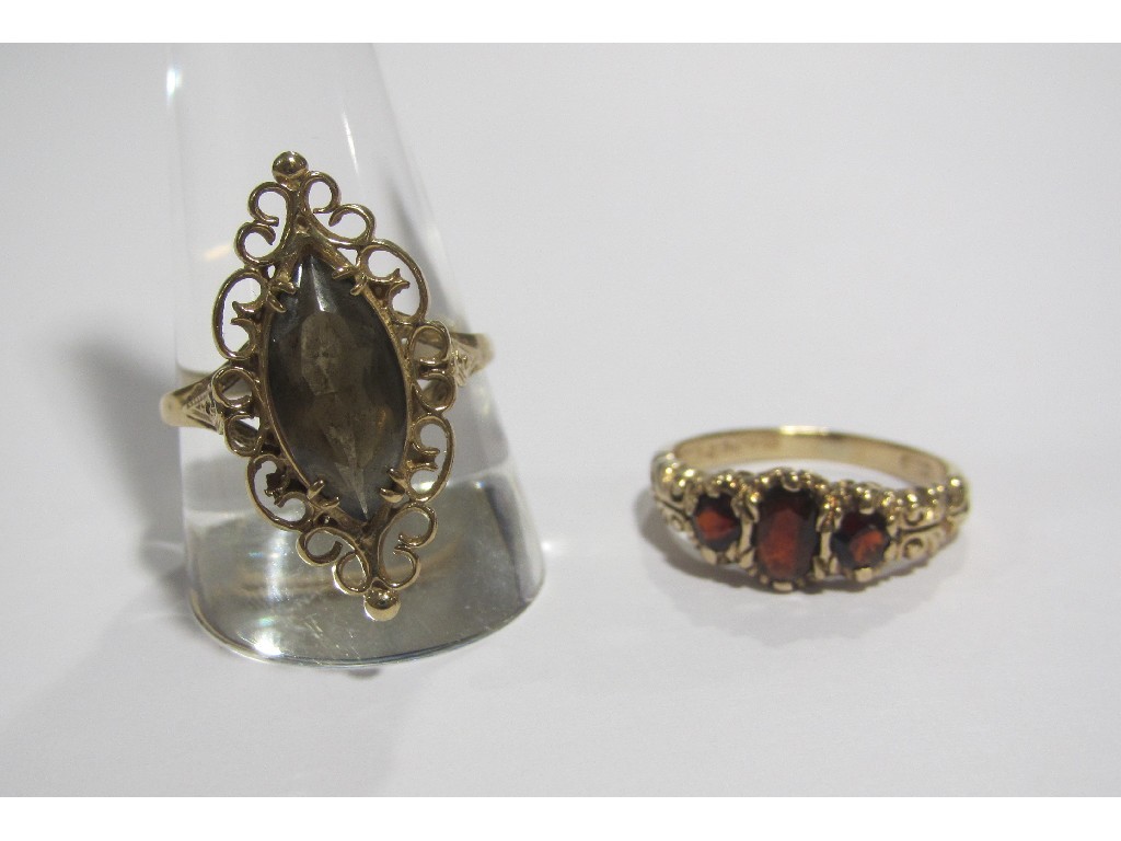 Appraisal: Lot comprising a ct gold garnet three stone ring and