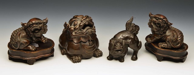 Appraisal: A GROUP OF FOUR CHINESE BRONZE MODELS OF DOGS OF