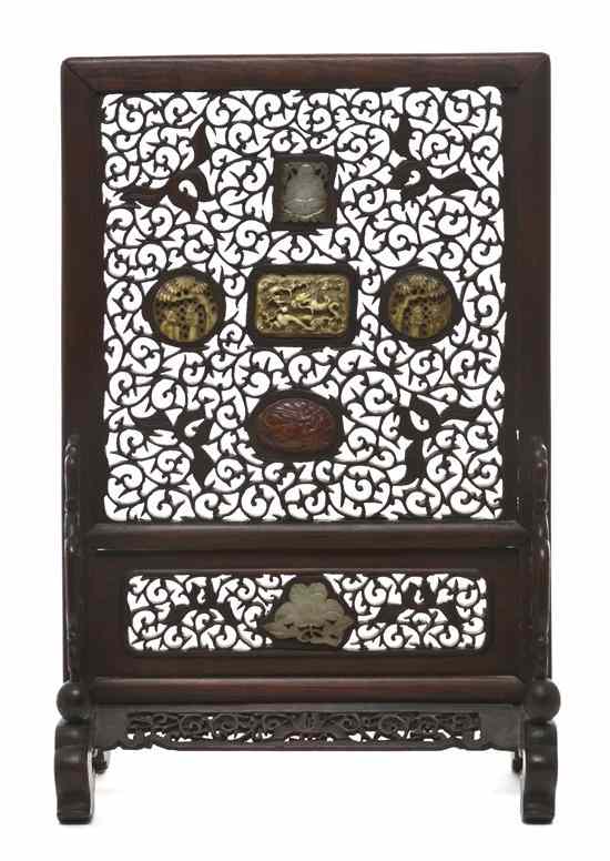 Appraisal: A Pierce Carved Hardwood Tablescreen of rectangular form having mounted