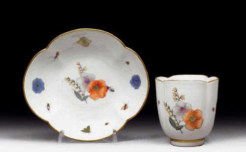 Appraisal: PAIR OF FOUR-SIDED CUPS AND SAUCERS Meissen mid th century