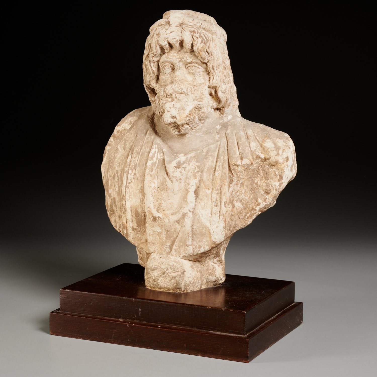 Appraisal: LARGE EGYPTO-ROMAN BUST OF SERAPIS c AD Egypt likely stucco