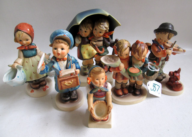 Appraisal: SIX HUMMEL FIGURINES soft past porcelain Stormy Weather HUM TM-