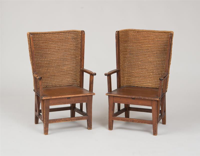 Appraisal: PAIR OF ENGLISH OKNEY ISLAND PAINTED PINE AND HEMP FIRESIDE