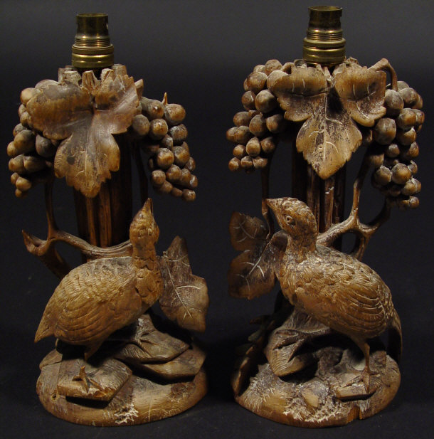 Appraisal: Pair of Middle Eastern hardwood table lamps carved with grapevine