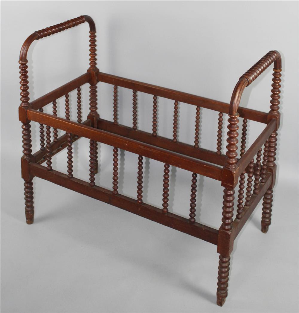 Appraisal: JENNY LIND CRADLE the ends with curved fluted and spool