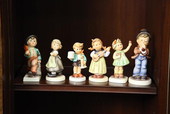 Appraisal: SIX HUMMEL FIGURES ''Forever Yours'' ''Serenade'' ''Spring Waltz'' A boy