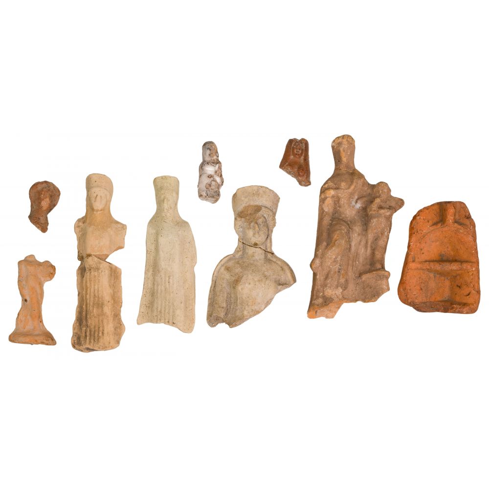 Appraisal: GREEK CLASSICAL POTTERY FIGURINE ASSORTMENT items including Demeter and a