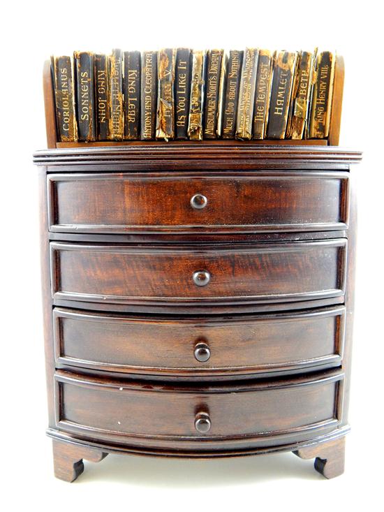 Appraisal: Miniatures two pieces chest and book rack four drawer bow