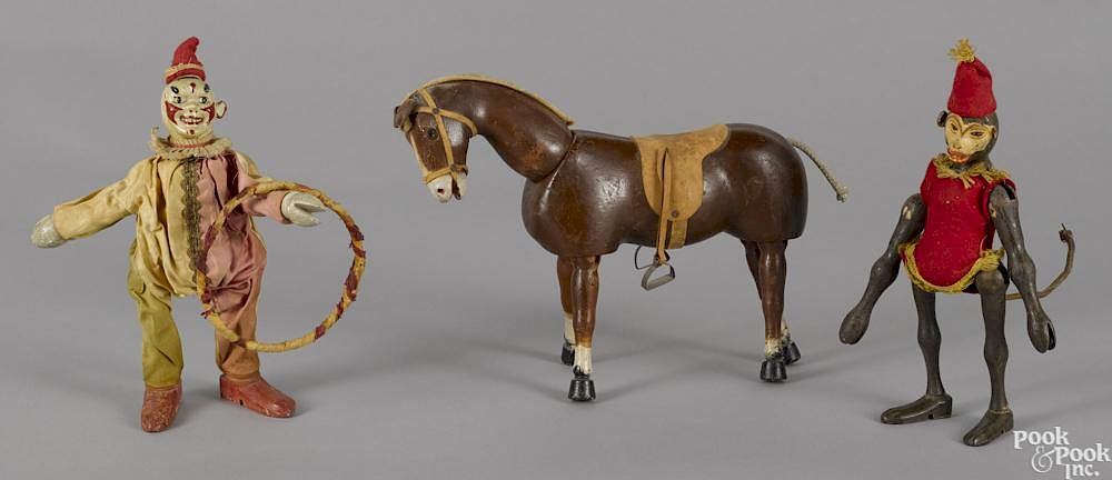 Appraisal: Three Schoenhut painted wood figures to include a horse with