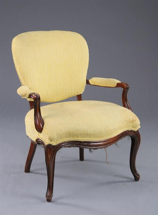 Appraisal: PROVINCIAL LOUIS XV STYLE FAUTEUIL th century fruitwood Padded and