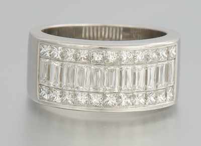 Appraisal: A Platinum and Diamond Ring by Christopher Designs Crisscut platinum