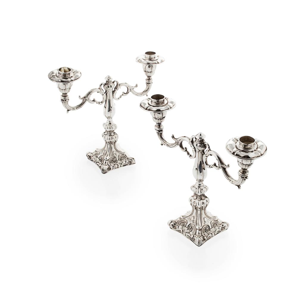 Appraisal: A pair of table two light candelabra marked Camusso Sterling