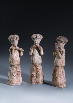 Appraisal: Three Chinese unglazed pottery models of female musicians Tang dynasty