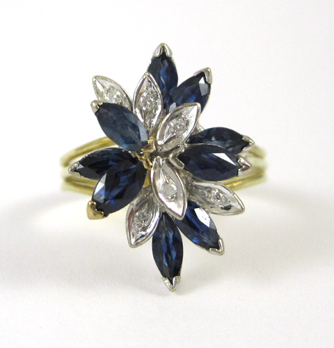 Appraisal: SAPPHIRE DIAMOND AND FOURTEEN KARAT GOLD RING The yellow and