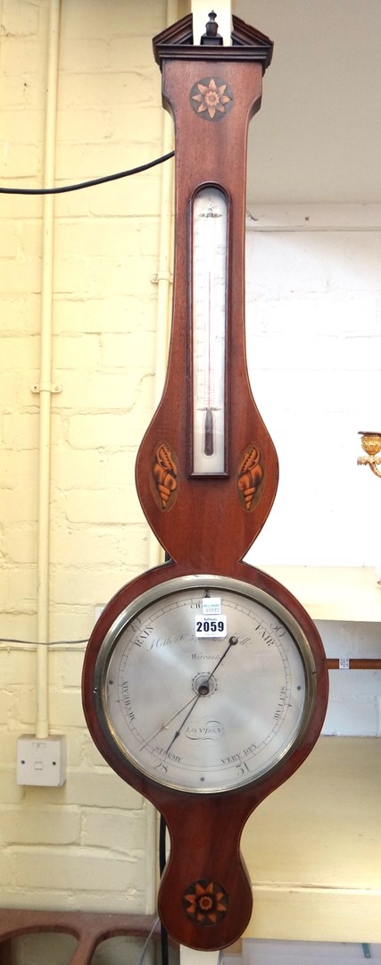 Appraisal: An Edwardian mahogany wheel barometer by J Cetti and Co