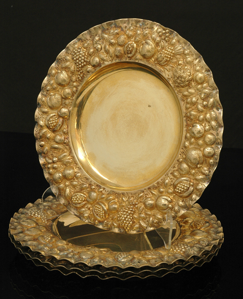 Appraisal: A SET OF FOUR VICTORIAN SILVER GILT BERRY PLATES Maker's