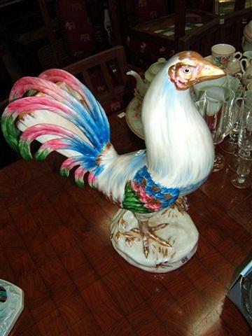 Appraisal: A hand painted Portuguese porcelain figure of a cockerel high