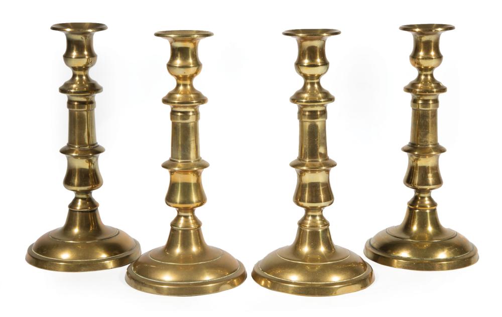 Appraisal: Four Antique English Brass Baluster-Form Candlesticks h in