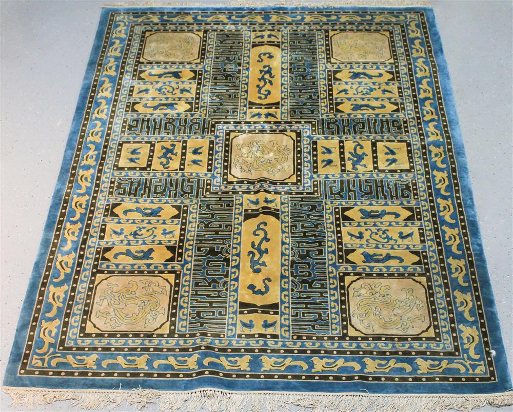 Appraisal: CHINESE RUG WITH SILK HIGHLIGHTS in blue and brown primary