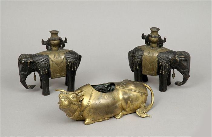 Appraisal: Pair of Chinese Parcel-Gilt Bronze Elephant-Form Candlesticks Together with a