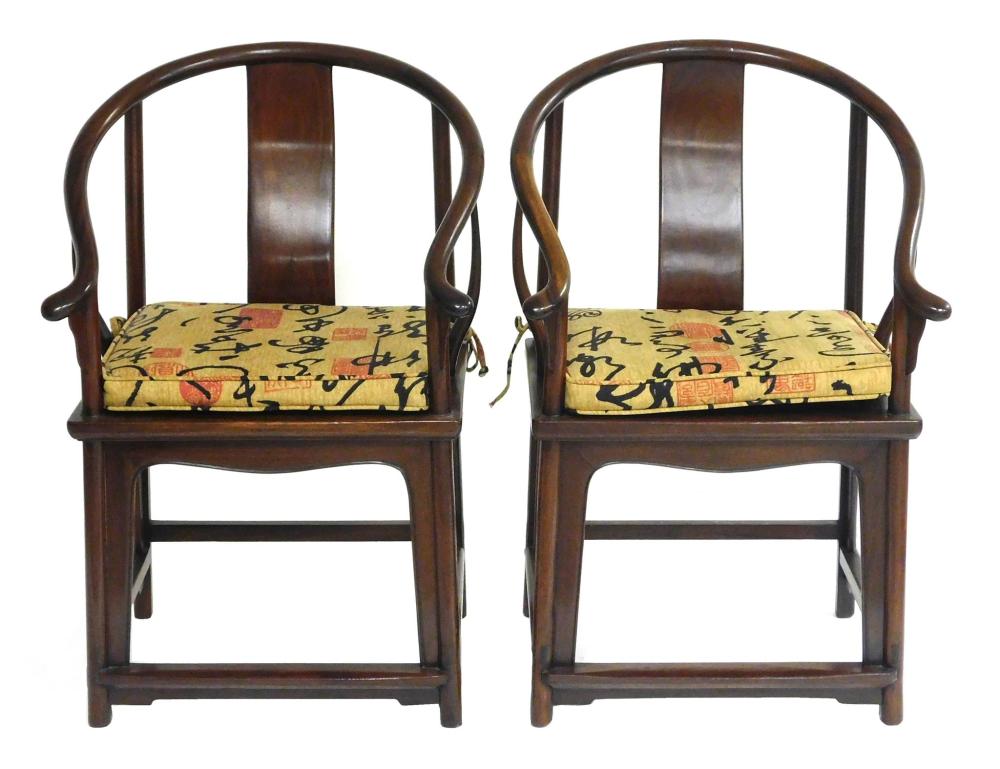 Appraisal: Two Asian style horseshoe chairs hardwood curved crest rail and