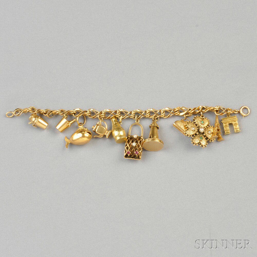 Appraisal: Gold Charm Bracelet composed of eleven kt and kt gold