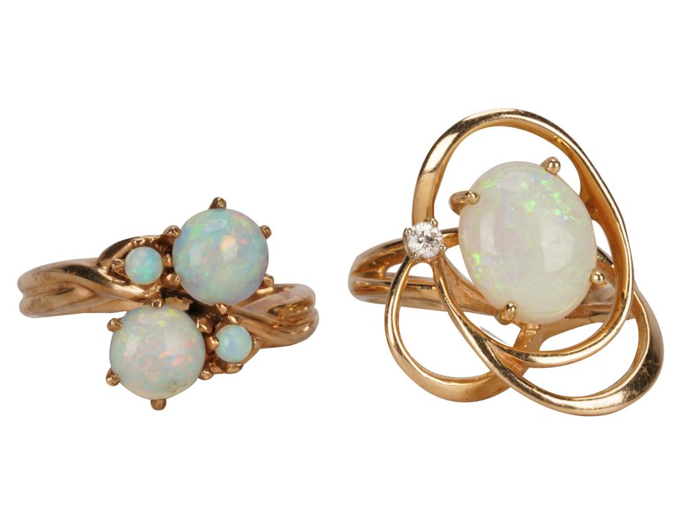 Appraisal: TWO YELLOW GOLD OPAL RINGSthe karat yellow gold ring centering