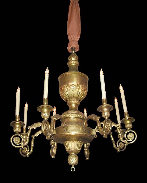 Appraisal: A French Neoclassical gilt bronze and brass eight light chandelier