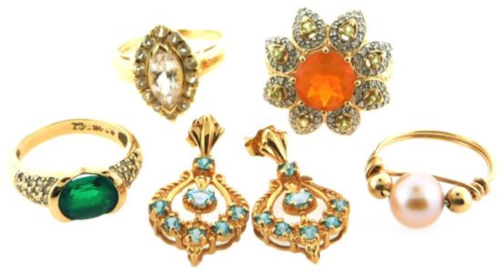 Appraisal: JEWELRY Five yellow gold pieces including four rings and a