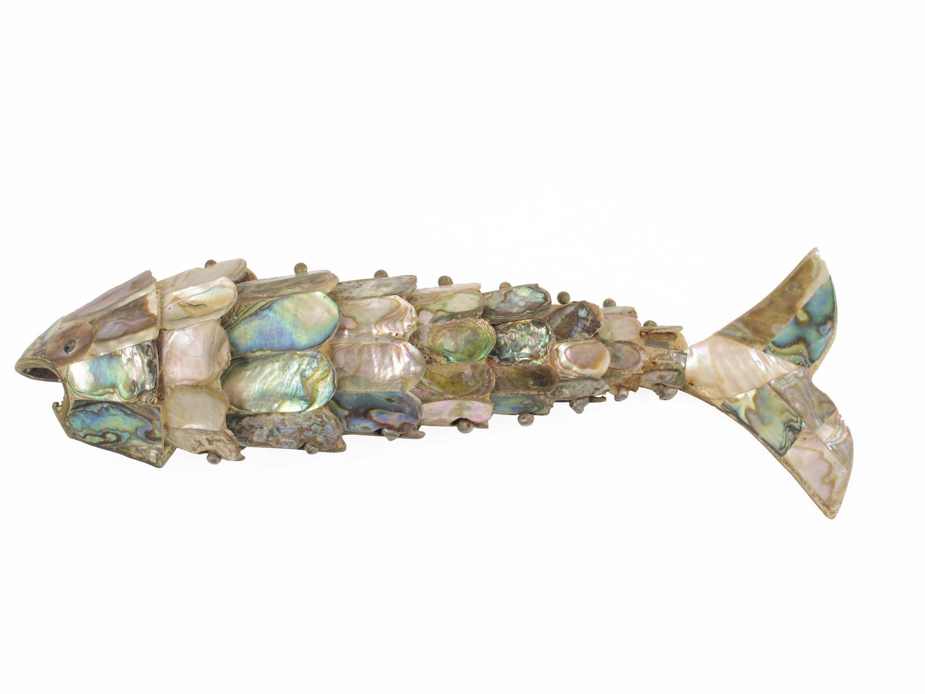 Appraisal: An abalone mounted articulated fish bottle opener