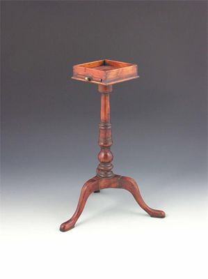 Appraisal: A yew wood miniature candlestand the galleried square top with