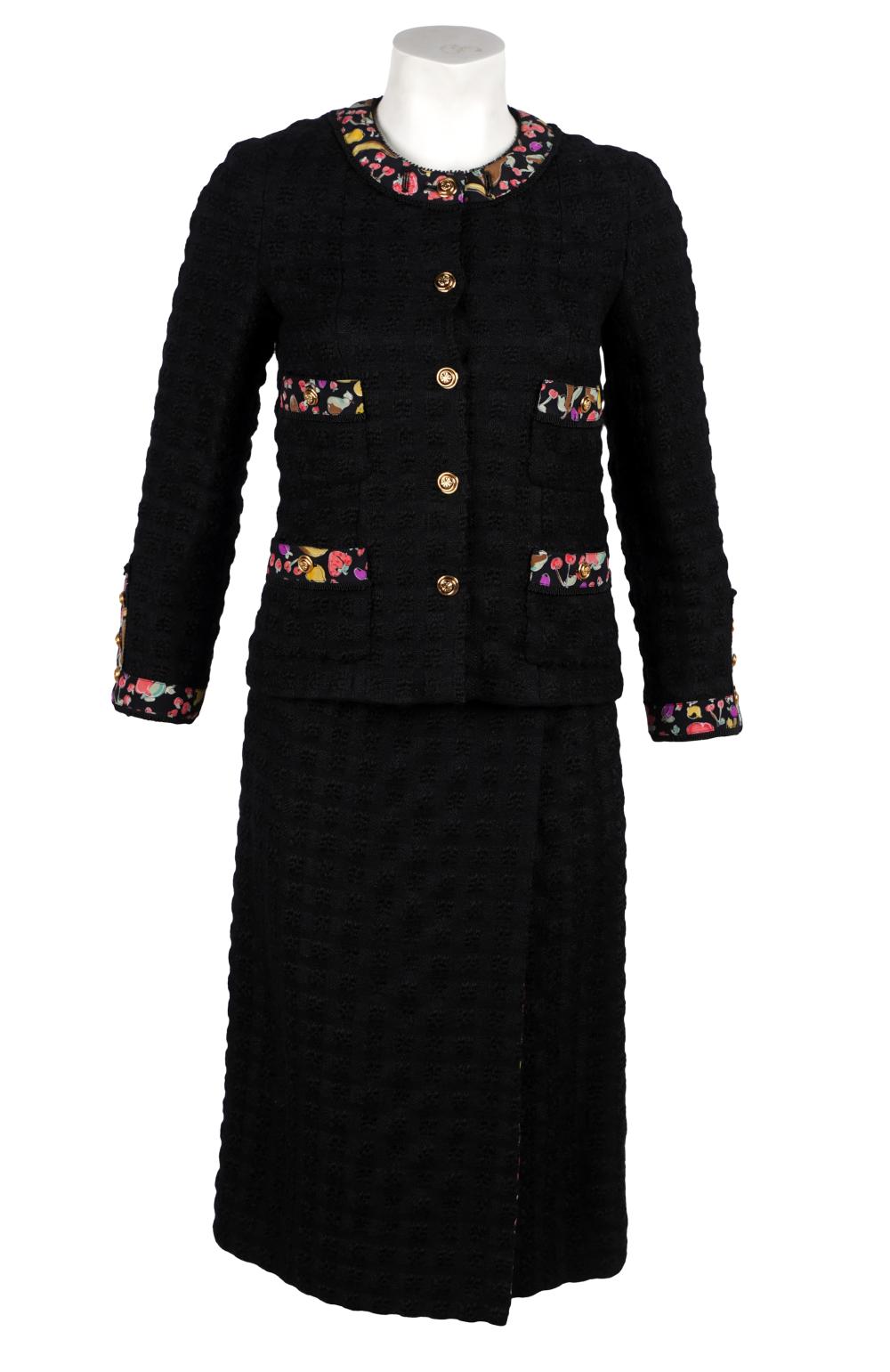 Appraisal: CHANEL BLACK ENSEMBLEwool and silk comprising wrap skirt jacket and