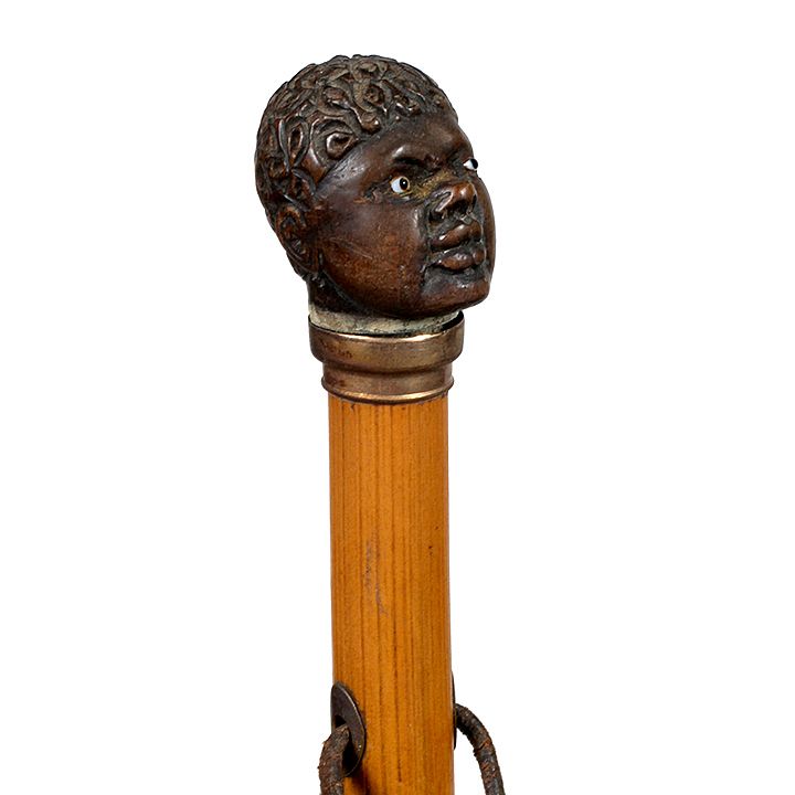 Appraisal: Blackamoor Dress Cane Ca - A carved hardwood Blackamoor with