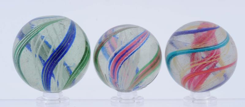 Appraisal: Lot Of Large Swirl Marbles Lot includes two multicolor white