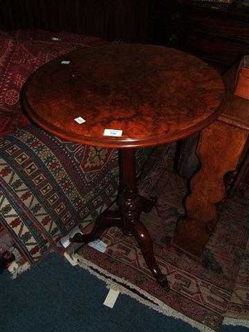 Appraisal: A Victorian walnut tripod occasional table with burr walnut veneered