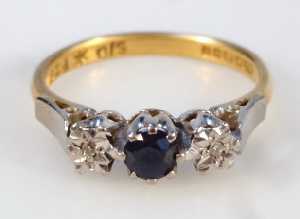 Appraisal: A sapphire and diamond three stone dress ring yellow metal