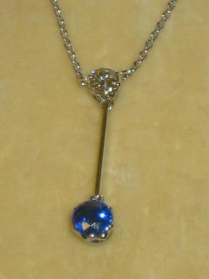 Appraisal: A SAPPHIRE AND DIAMOND PENDANT comprising brilliant cut diamond and