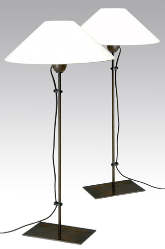 Appraisal: CHRISTIAN LIAGRE Pair of single-socket patinated metal table lamps with