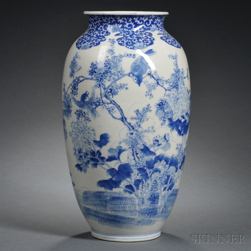 Appraisal: Blue and White Vase China decorated with birds and flowers